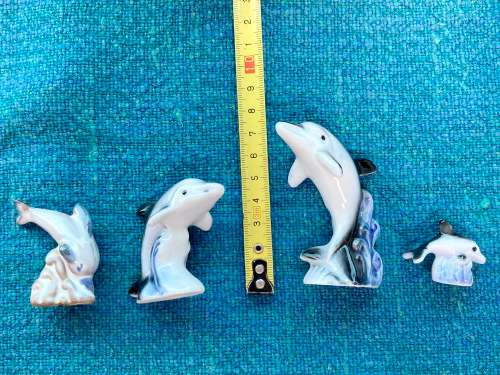 Porcelain dolphins (4) vintage, approx.from the  80s, collection item,