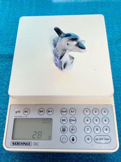 Porcelain dolphins (4) vintage, approx.from the  80s, collection item,