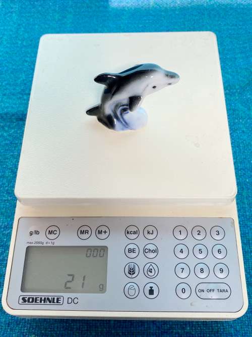 Porcelain dolphins (4) vintage, approx.from the  80s, collection item,