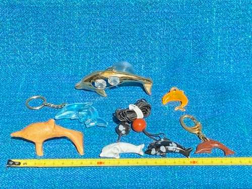 Porcelain dolphins (4) vintage, approx.from the  80s, collection item,