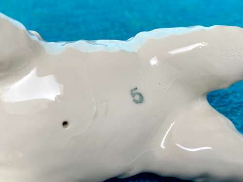 Porcelain dog refurbished