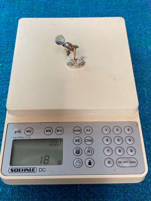 Dolphin figure with glass ball , vintage , collecorts item
