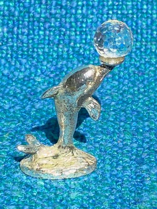 Dolphin figure with glass ball , vintage , collecorts item
