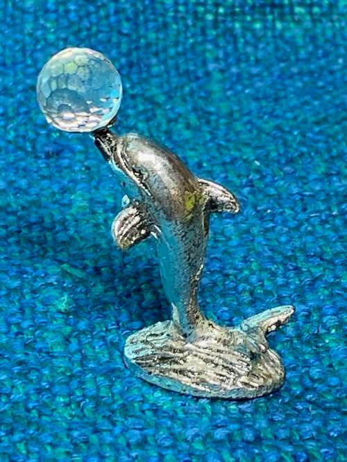Dolphin figure with glass ball , vintage , collecorts item