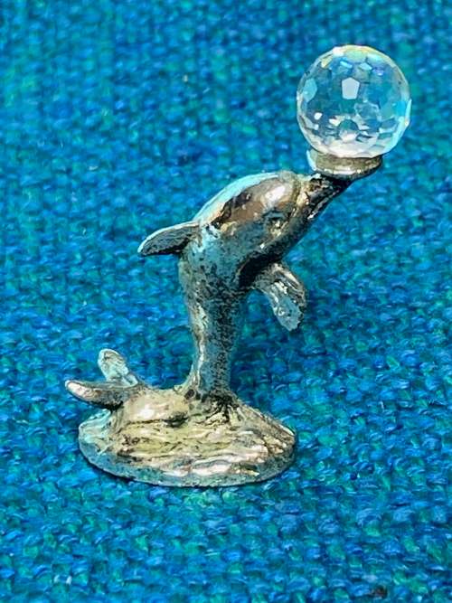 Dolphin figure with glass ball , vintage , collecorts item