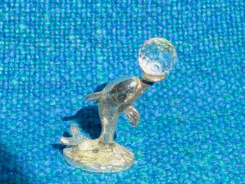 Dolphin figure with glass ball , vintage , collecorts item