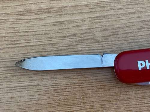1 x Victorinox knife / Philips Fotolicht , red, collectors item