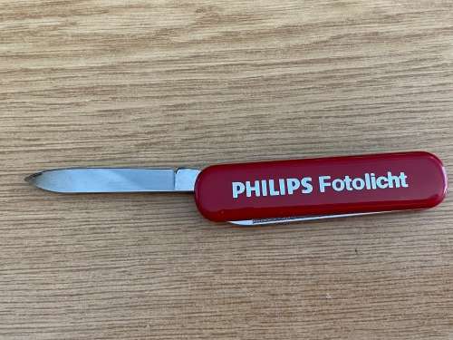 1 x Victorinox knife / Philips Fotolicht , red, collectors item