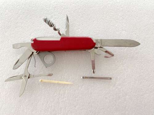 Victorinox Officier Suisse (red) vintage, pocket knife,Switzerland, stainless, rostfrei,
