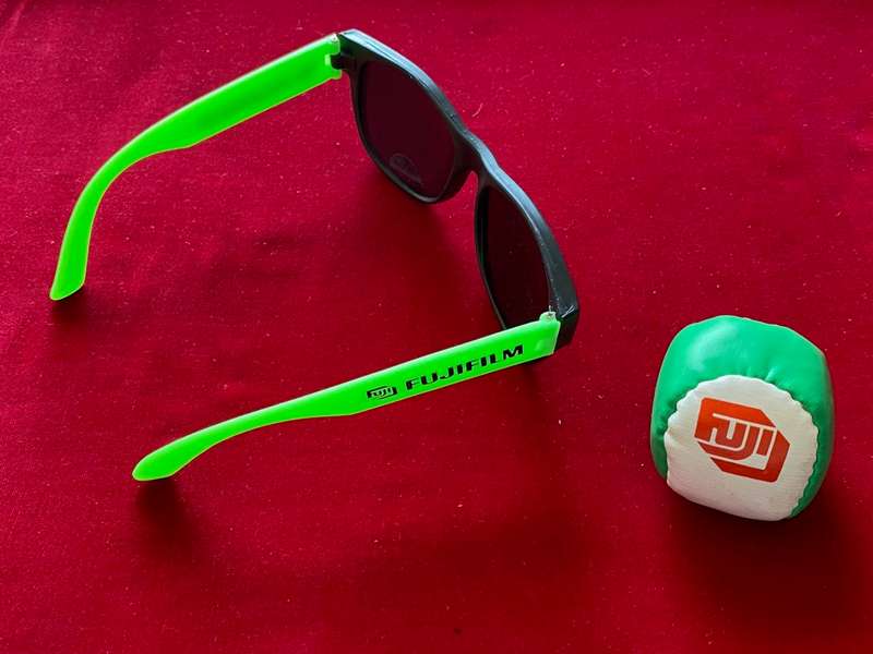 FUJI Film Lot from the 80s , sun-glasses, juggling ball, waterball, Fujifilm marketing items, unused