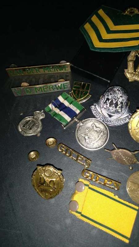 various mixed south african service medals pins and hats from saps police and prison warden