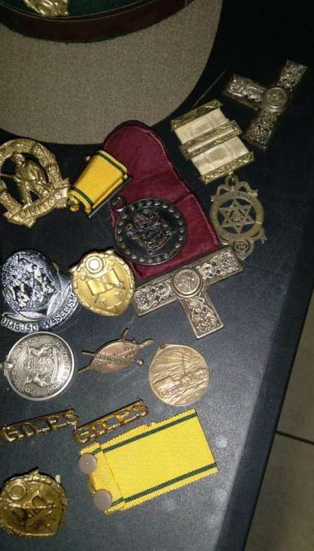 various mixed south african service medals pins and hats from saps police and prison warden
