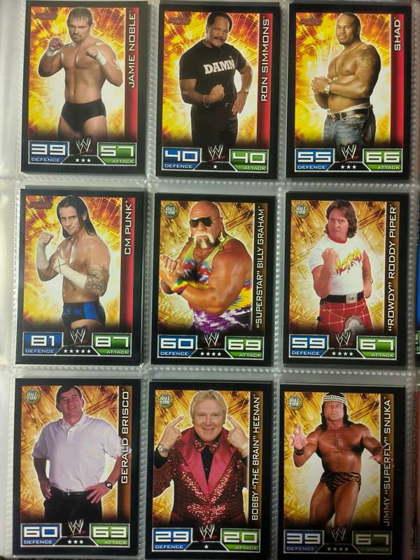 Lot of WWE cards including binder and playmat