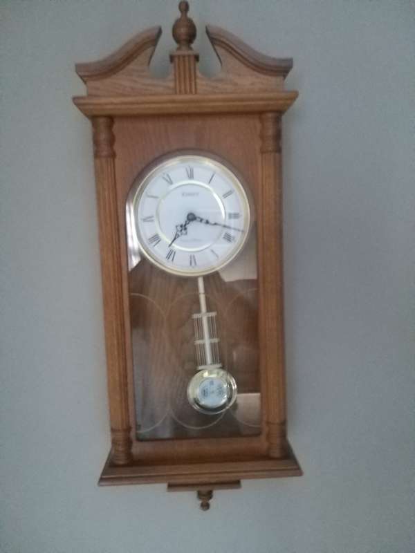 # Reduced# Timeless Walnut Finish Wall Clock
