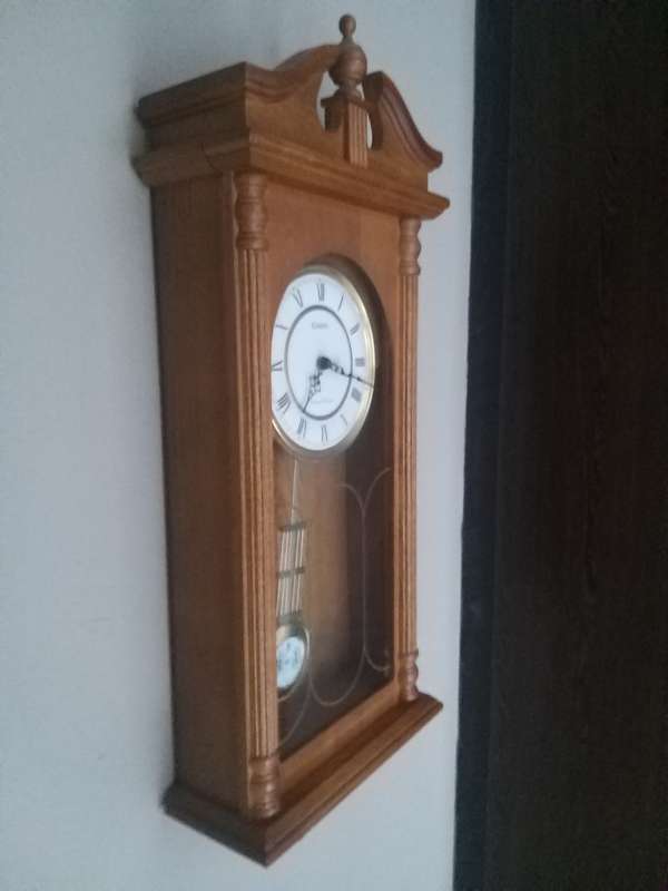 # Reduced# Timeless Walnut Finish Wall Clock