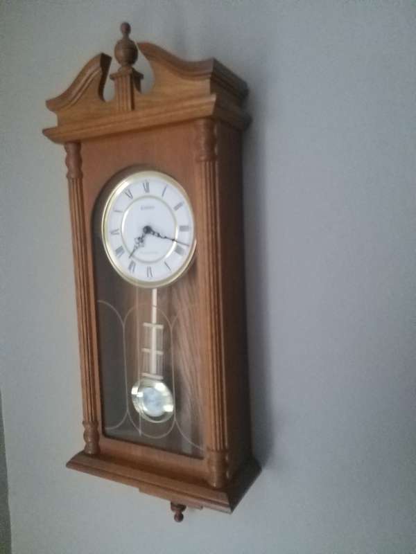# Reduced# Timeless Walnut Finish Wall Clock