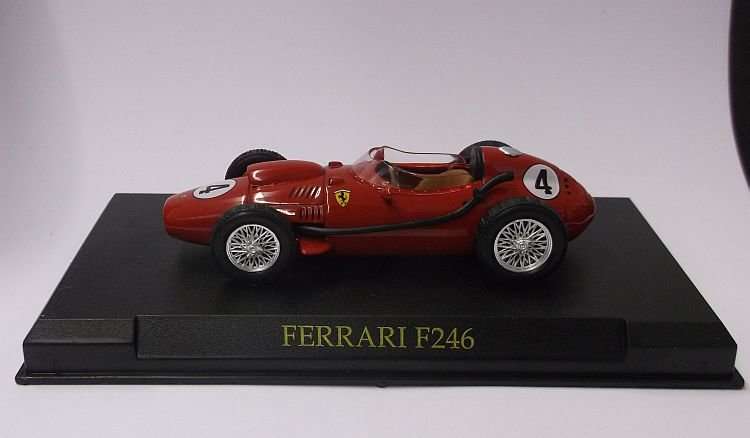 A BEAUTIFULLY DETAILED DIE CAST METAL MODEL OF THE FERRARI F246 ...WITH DISPLAY BASE...WOW !!!