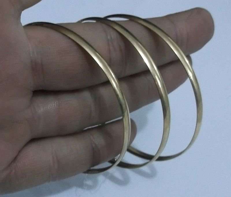FANTASTIC DEAL .....THREE GORGEOUS SOLID 9 CARAT GOLD BANGLES ....BID FOR THE LOT