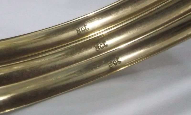 FANTASTIC DEAL .....THREE GORGEOUS SOLID 9 CARAT GOLD BANGLES ....BID FOR THE LOT