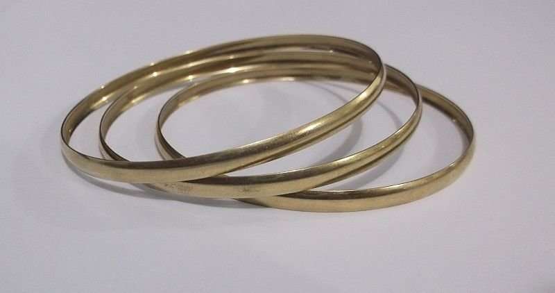 FANTASTIC DEAL .....THREE GORGEOUS SOLID 9 CARAT GOLD BANGLES ....BID FOR THE LOT