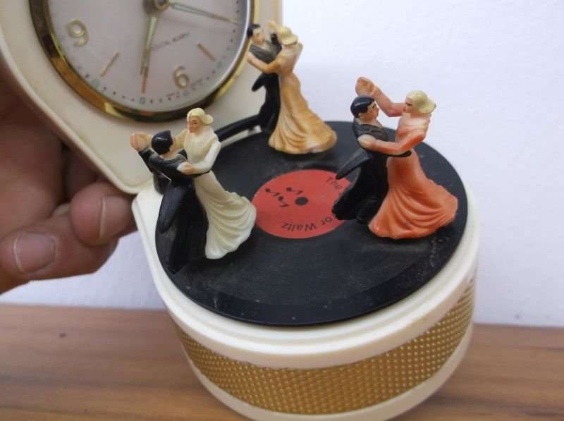 A HEART WARMING VINTAGE MUSICAL ALARM WITH MOVING "RECORD DANCERS" ...MUST SEE TO APPRECIATE !!!