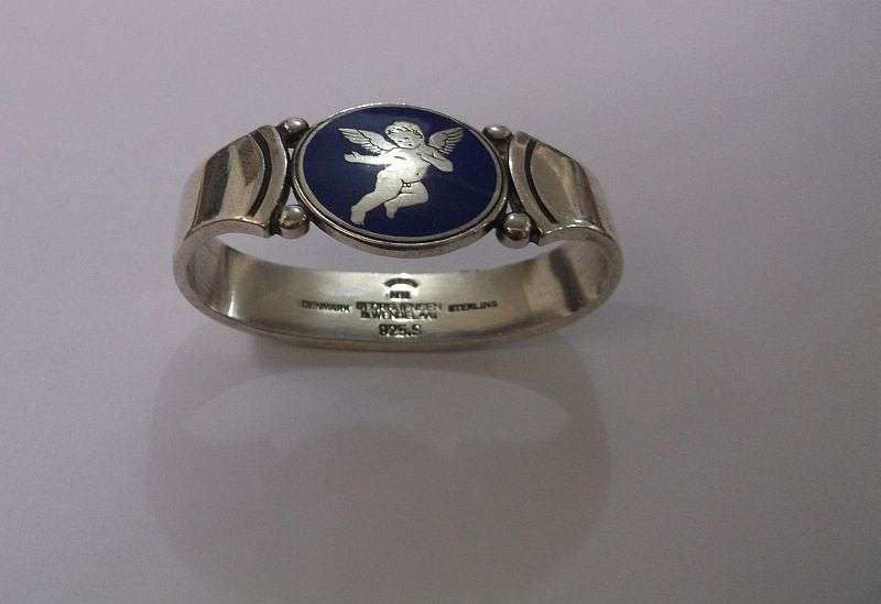 WOW !!! AN AWESOME RARE SOLID STERLING SILVER GEORG JENSEN NAPKIN RING WITH ENAMELED CHERUB MOTIF