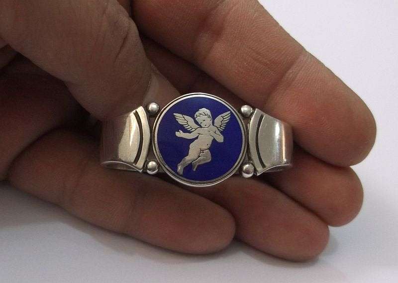 WOW !!! AN AWESOME RARE SOLID STERLING SILVER GEORG JENSEN NAPKIN RING WITH ENAMELED CHERUB MOTIF