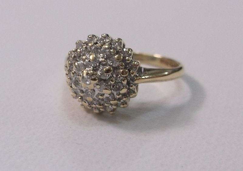 A BREATHTAKING HALLMARKED 9 CT GOLD RING SET WITH 35 DIAMONDS VALUED AT R 15 000 ...MUST SEE !!!!