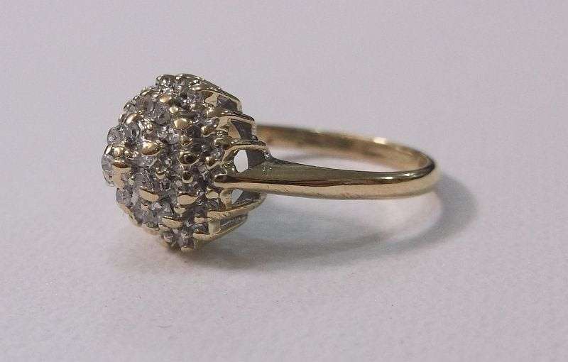 A BREATHTAKING HALLMARKED 9 CT GOLD RING SET WITH 35 DIAMONDS VALUED AT R 15 000 ...MUST SEE !!!!