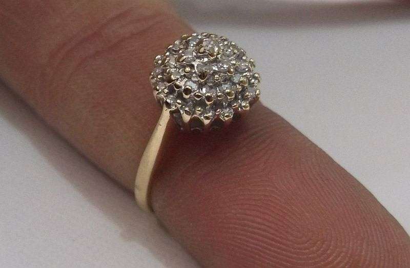 A BREATHTAKING HALLMARKED 9 CT GOLD RING SET WITH 35 DIAMONDS VALUED AT R 15 000 ...MUST SEE !!!!