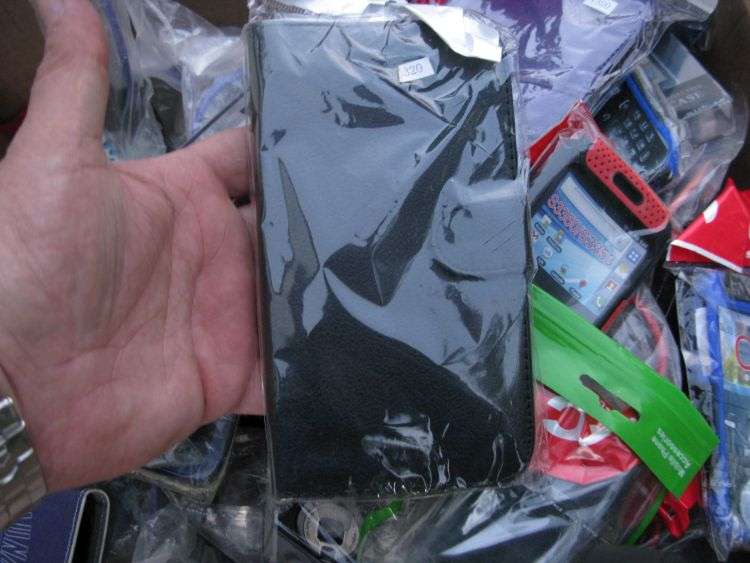WOW !! WOW !!! A JOB LOT OF 150 CELLPHONE COVERS , CASES , BACKINGS ETC ...BID PER PIECE TO TAKE ALL