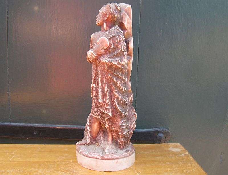 A MOST UNUSUAL AND HEAVY FOR SIZE "TRIBAL" FIGURE ...LOOKS LIKE A MAORI WARRIOR