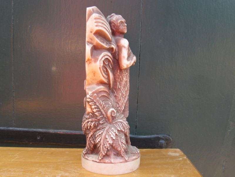 A MOST UNUSUAL AND HEAVY FOR SIZE "TRIBAL" FIGURE ...LOOKS LIKE A MAORI WARRIOR