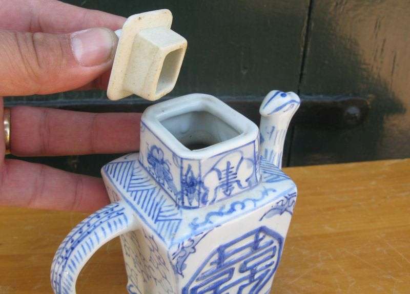 AN EYE CATCHING VINTAGE HAND PAINTED MINIATURE TEAPOT WITH CHINESE THEME AND FIGURAL SPOUT...WOW !!