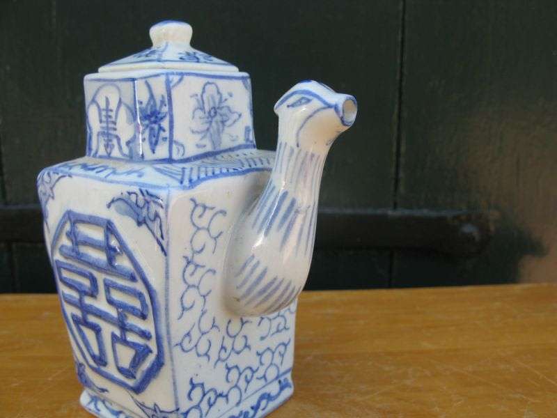 AN EYE CATCHING VINTAGE HAND PAINTED MINIATURE TEAPOT WITH CHINESE THEME AND FIGURAL SPOUT...WOW !!
