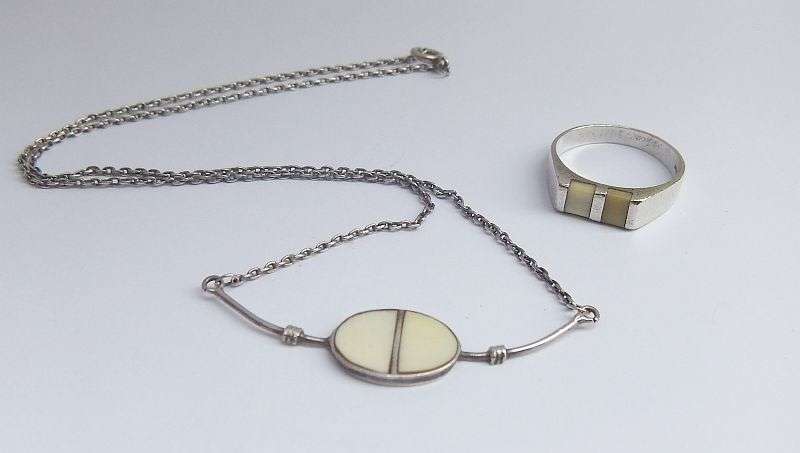 A FANTASTIC STERLING SILVER NECKLACE AND STERLING SILVER RING WITH INTERESTING INSETS ...TAKE A LOOK
