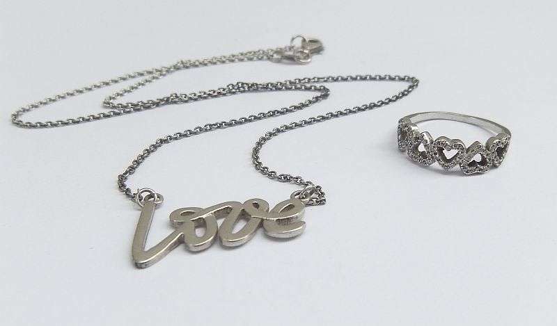 LOVELY !! A STERLING SILVER NECKLACE WITH "LOVE" PENDANT PLUS A STERLING SILVER HEART RING !! WOW !!