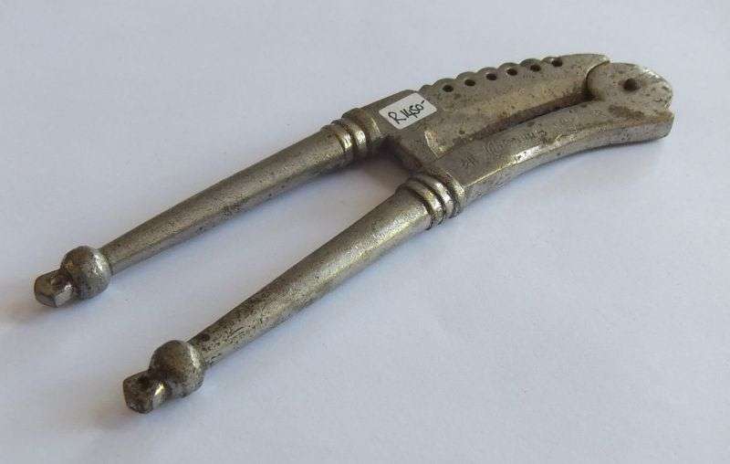 A RARE ANTIQUE BETEL NUT CUTTER - HIGH VALUE ITEM