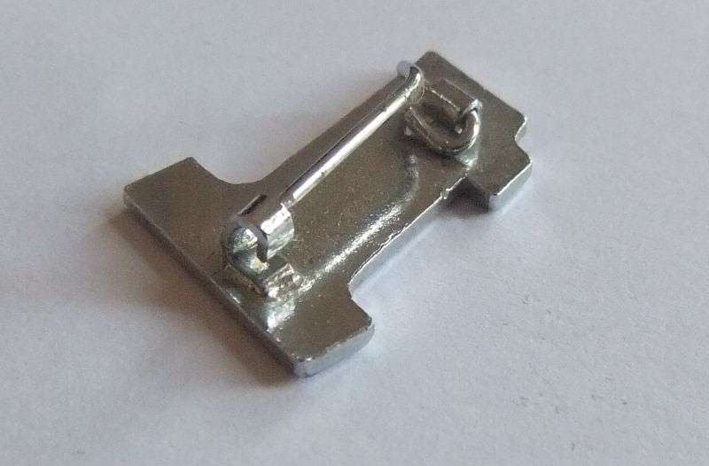 A VINTAGE ENAMEL AND METAL BIKER BADGE - HONDA
