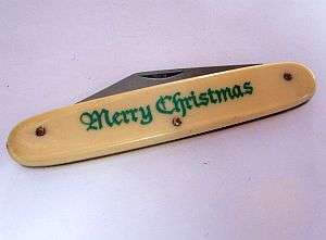 A VINTAGE MERRY CHRISTMAS POCKET KNIFE
