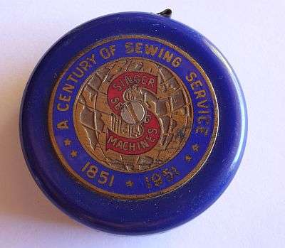 COLLECTABLE - 1951 CENTENARY SINGER MEASURING TAPE