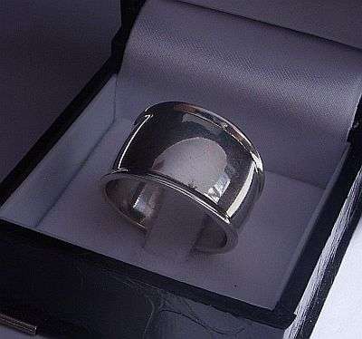 A MARVELOUS WIDE AND TOUGH SOLID STERLING SILVER RING - LOOKS NEW !!!