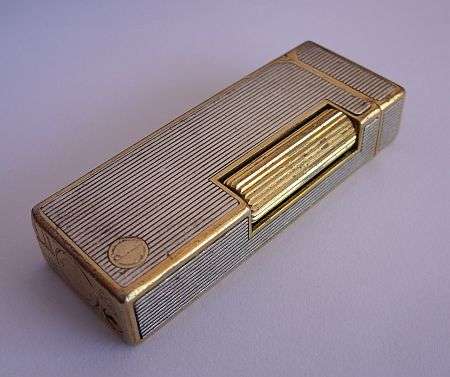 ULTRA COOOOOL !!!! A VINTAGE DUNHILL LIGHTER WITH STERLING SILVER PANELS - SPARKING - NEEDS TLC !!!!