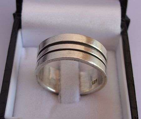 A VERY COOL , VERY HEAVY , WIDE , BRILLIANT SOLID STERLING SILVER RING - OH YEAH !!!