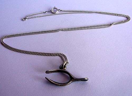 A BRAND NEW STERLING SILVER NECKLACE WITH A VINTAGE STERLING SILVER PENDANT - WISHBONE