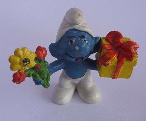 1970`s / 80`s VINTAGE SMURF WITH GIFT AND FLOWERS BY PEYO - WEST GERMANY