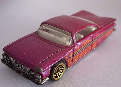 DIE CAST VEHICLE - `69 IMPALA BY HOTWHEELS
