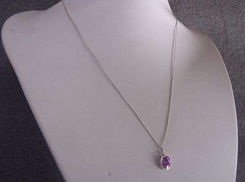 AN OUTSTANDING FACETED "AMETHYST" SET SILVER PENDANT WITH A STERLING SILVER NECKLACE !!!
