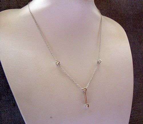 AN ELEGANT STERLING SILVER NECKLACE SET WITH FACETED CZ STONES !!!!! LAST ONE FOR CRAZY !!!!