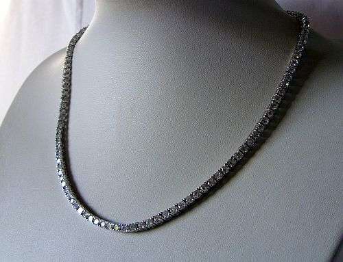 WOW !!! A STERLING SILVER DESIGNER ETERNITY NECKLACE WITH FACETED CZ STONES !!!! AMAZING FIND !!!!